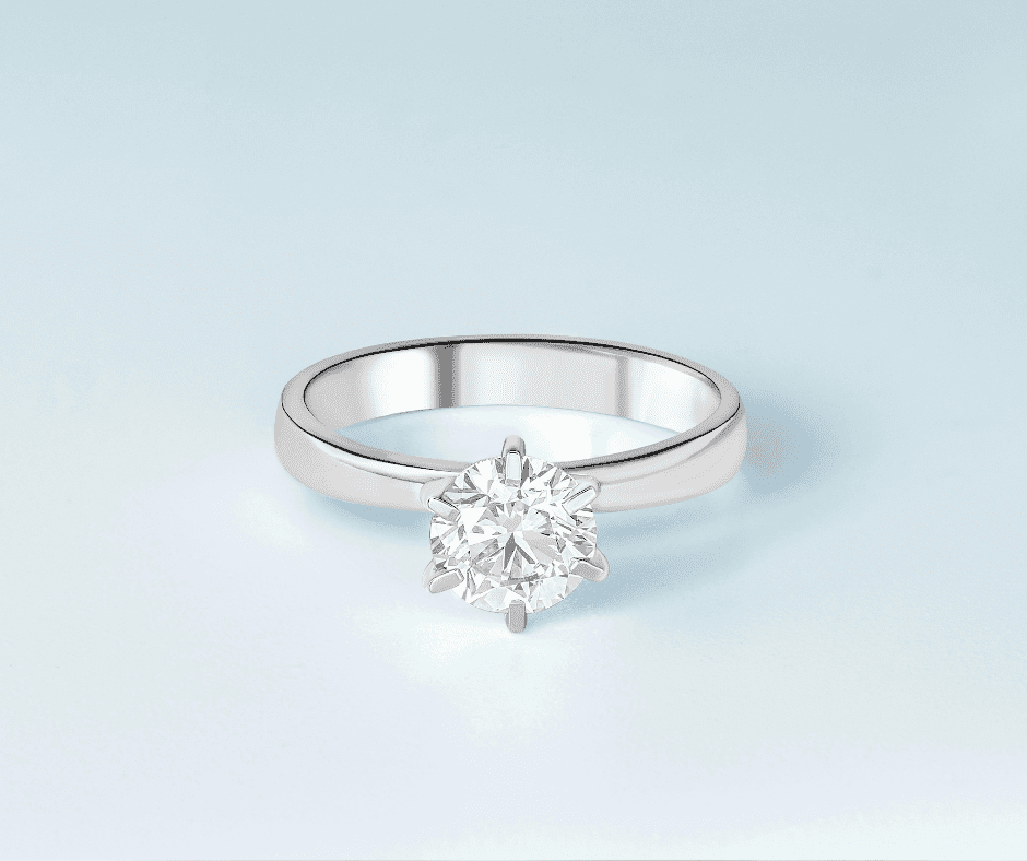 Sužadėtuvių žiedas su deimantu ant elegantiško fono